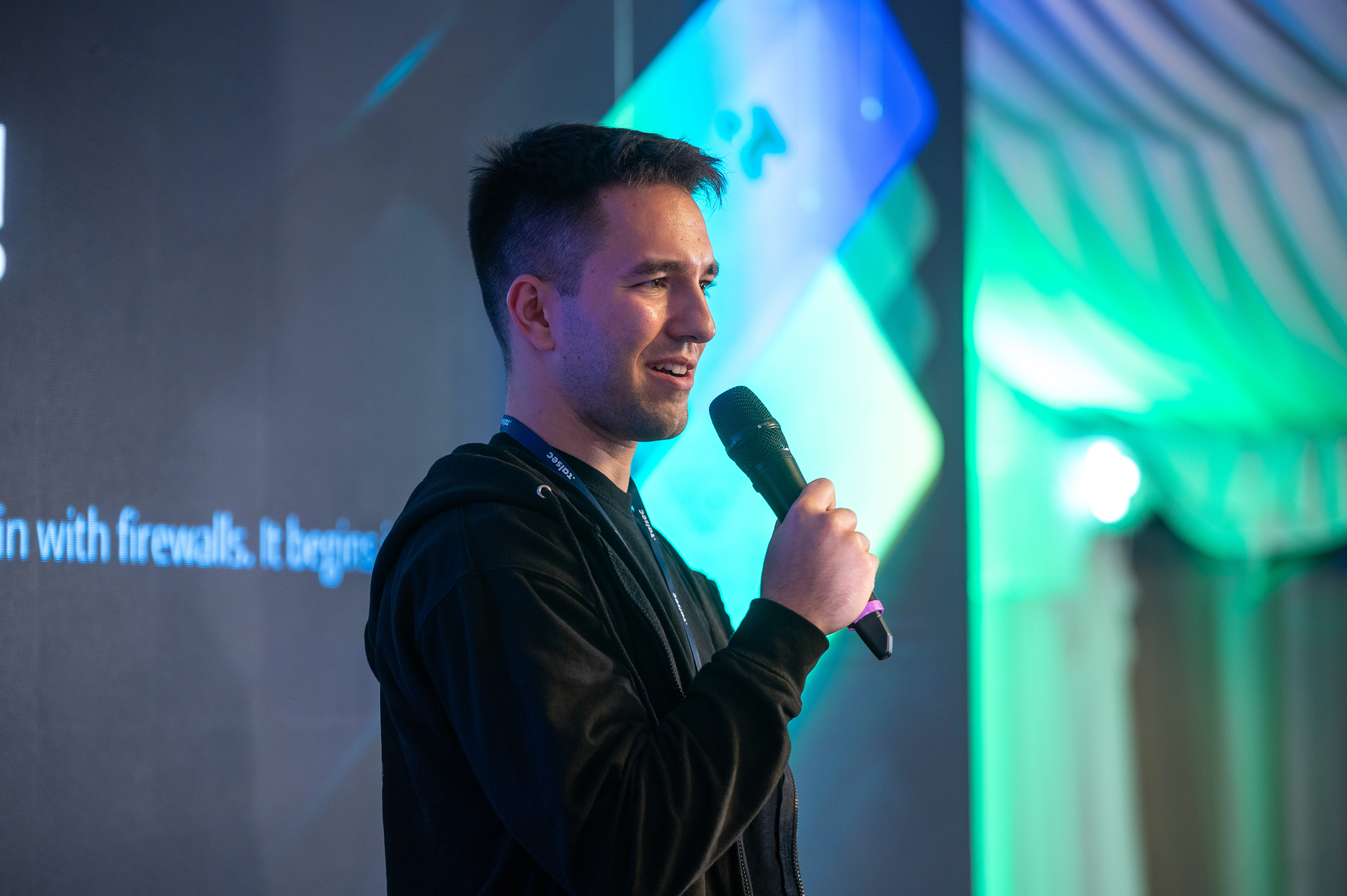 Adam Žilla presenting on the main stage